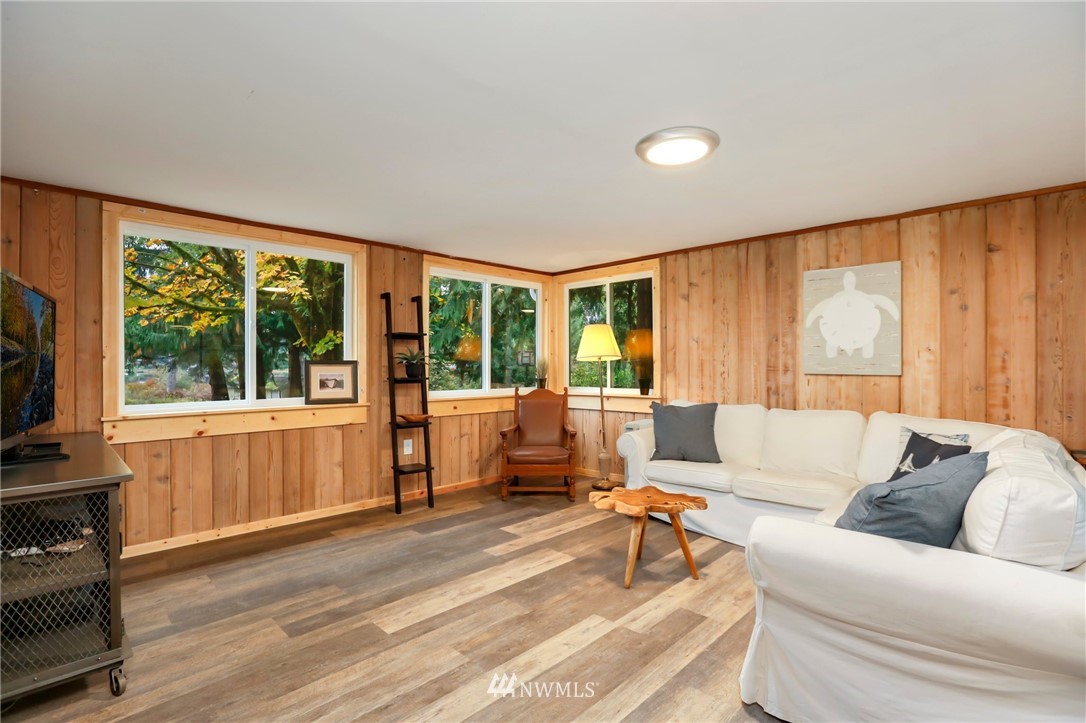 4717 Lerch Road Snohomish, WA 98290 - Photo 8 of 25 a living room with furniture and large windows