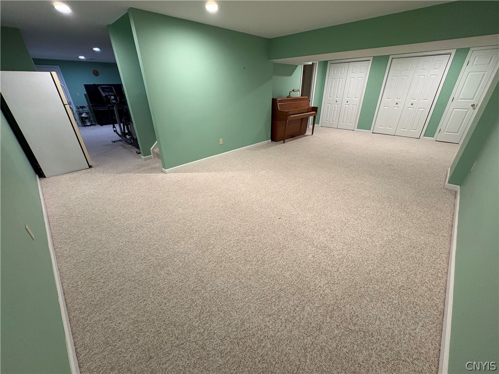 7892 East Ridge Pointe Drive Manlius, NY 13066 - Photo 40 of 46 Expansive finished lower level - per tax records, adds an additional 900 sq. ft.