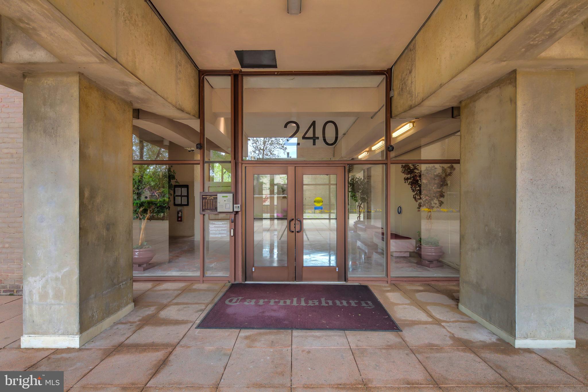 361 N Street Southwest, Unit 361 Washington, DC 20024 - Photo 25 of 27 Condominium tower and front desk entry