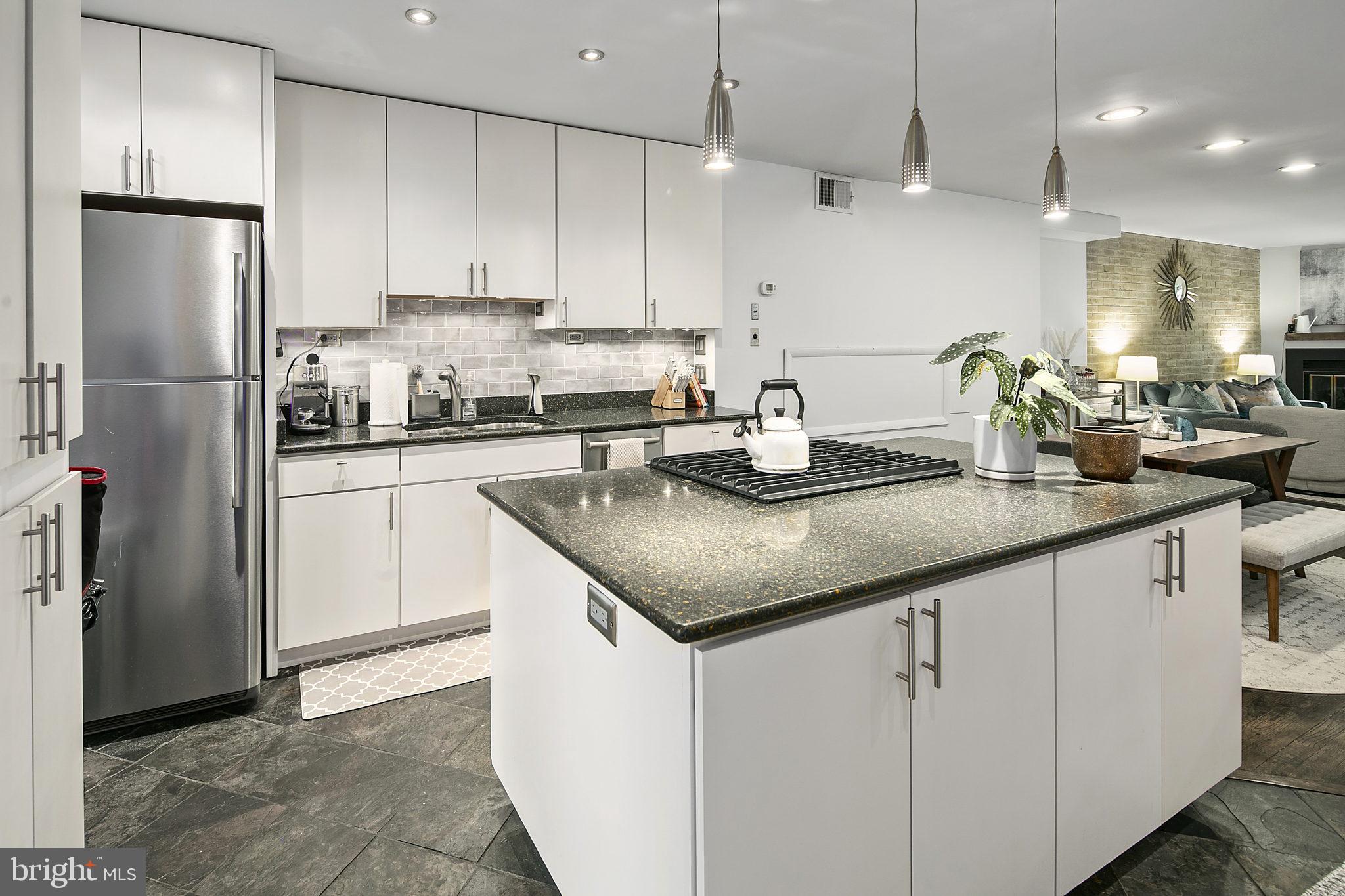 361 N Street Southwest, Unit 361 Washington, DC 20024 - Photo 6 of 52 Centered island with cooktop