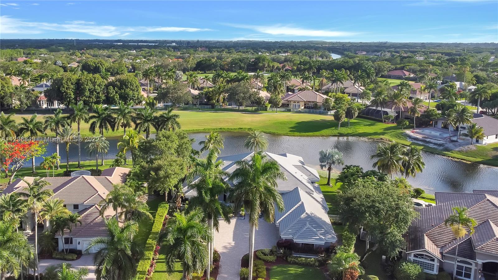 3088 Birkdale Drive Weston, FL 33332 - Photo 43 of 51 an aerial view of residential houses with outdoor space and river