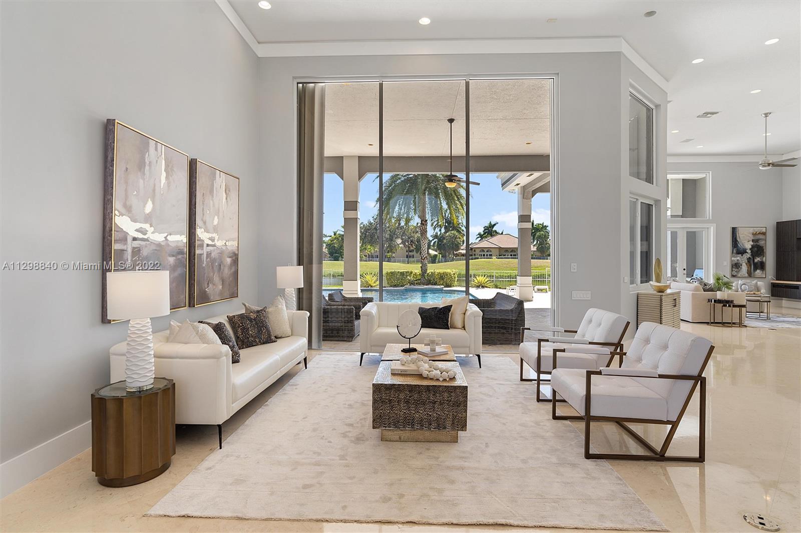 3088 Birkdale Drive Weston, FL 33332 - Photo 10 of 51 a living room with furniture and a large window