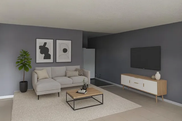 a view of an empty room with a window