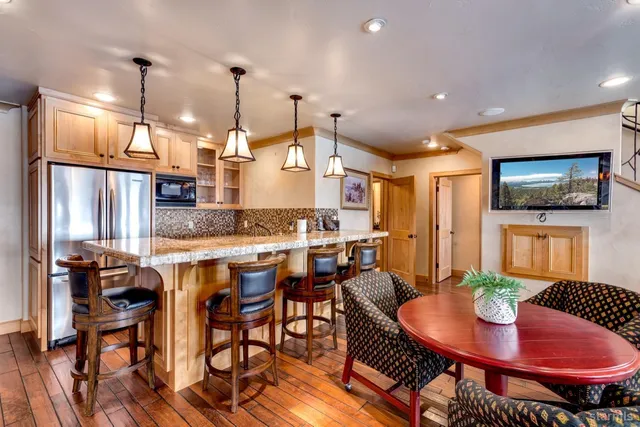 a view of a dining room with furniture