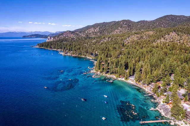 a view of an ocean and a mountain