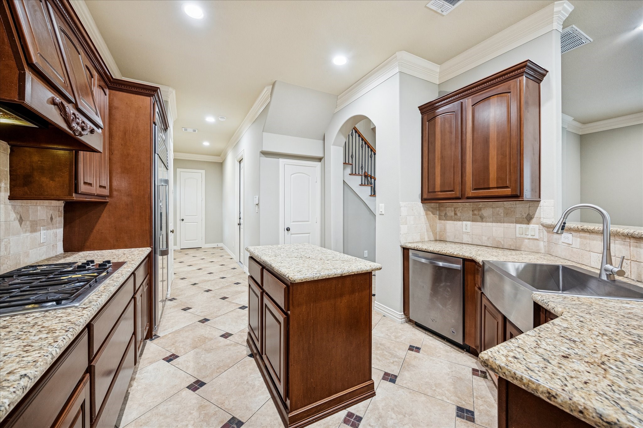 2 Schwab Lane Houston, TX 77055 - Photo 3 of 27 a kitchen with granite countertop a sink stove and refrigerator