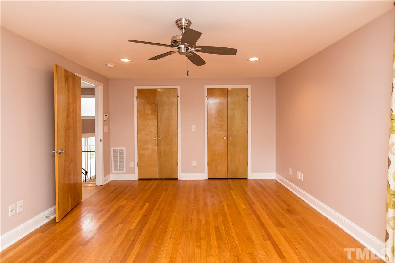 107 King William Road Raleigh, NC 27610 - Photo 12 of 25 a view of room with wooden floor and windows