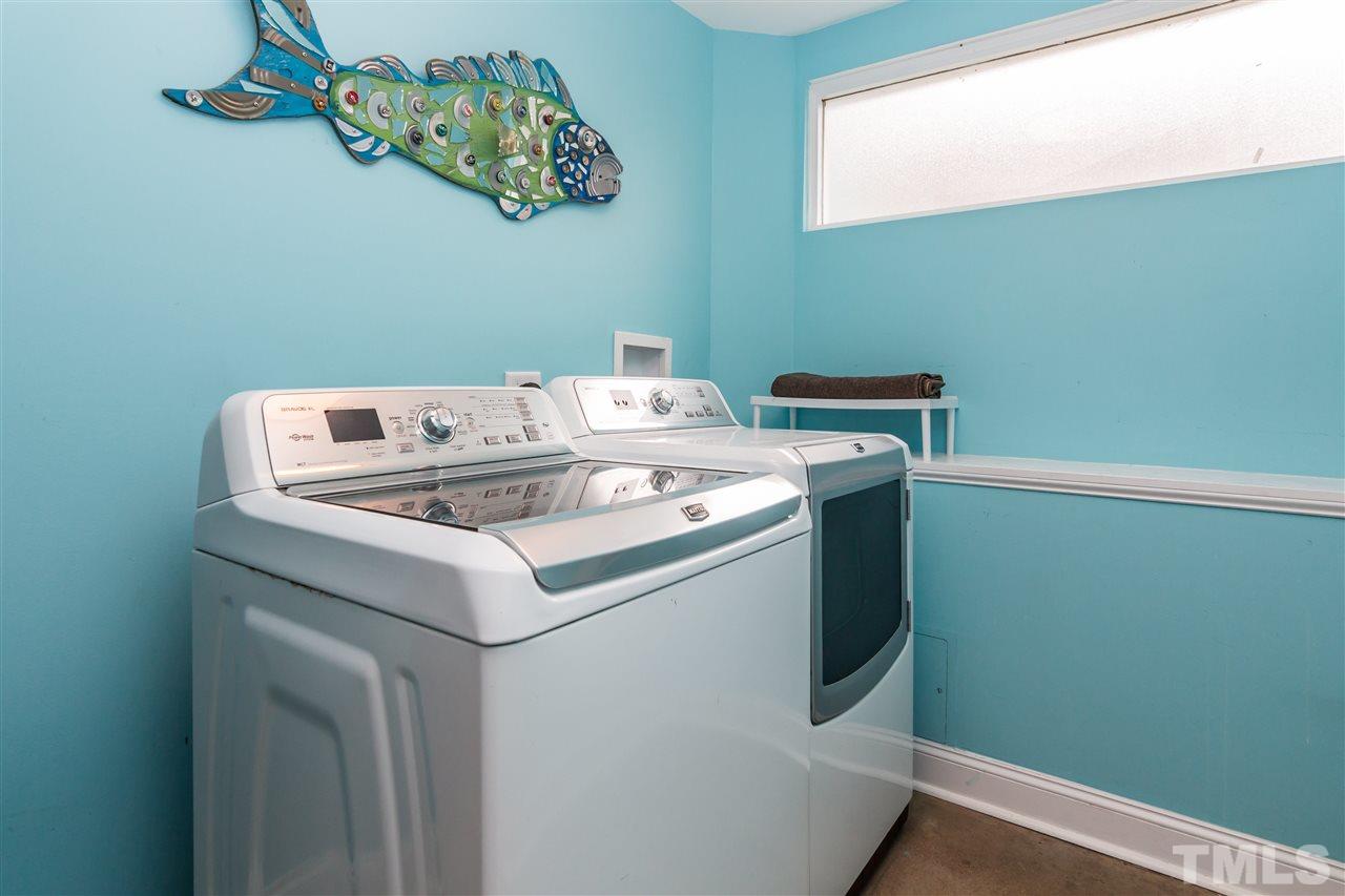 107 King William Road Raleigh, NC 27610 - Photo 20 of 25 a utility room with dryer and washer