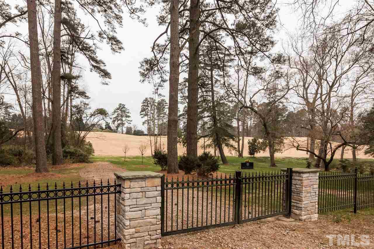 107 King William Road Raleigh, NC 27610 - Photo 21 of 25 a view of a park with large trees