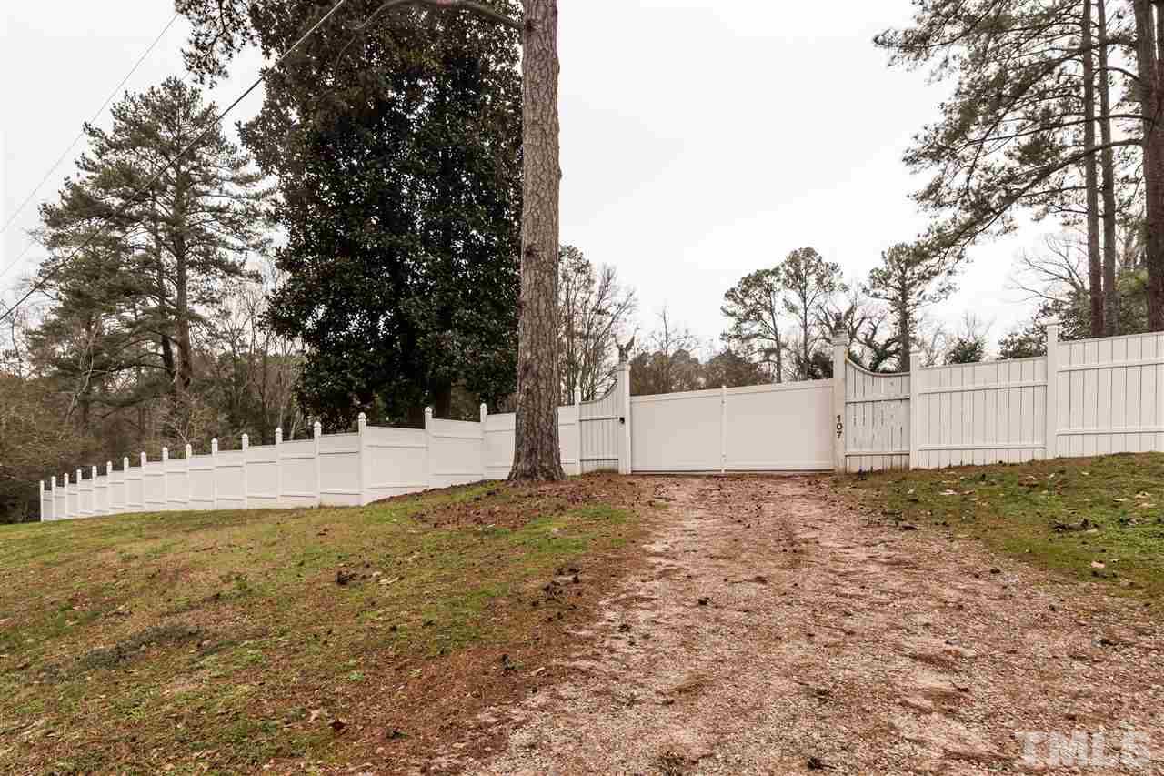 107 King William Road Raleigh, NC 27610 - Photo 22 of 25 a view of yard covered with snow