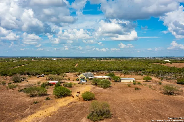 a view of lake with green space