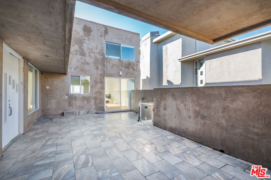 3711 Ocean Front Walk, Unit 3 Marina del Rey, CA 90292 - Photo 30 of 43 a view of a hallway with brick walls