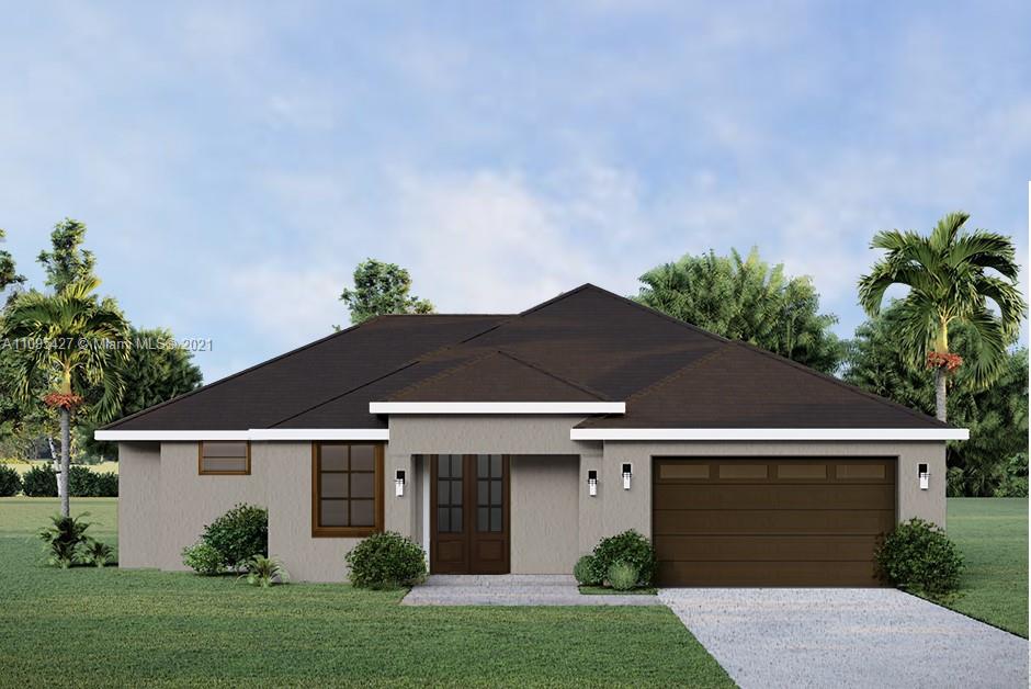 a front view of house with a garden