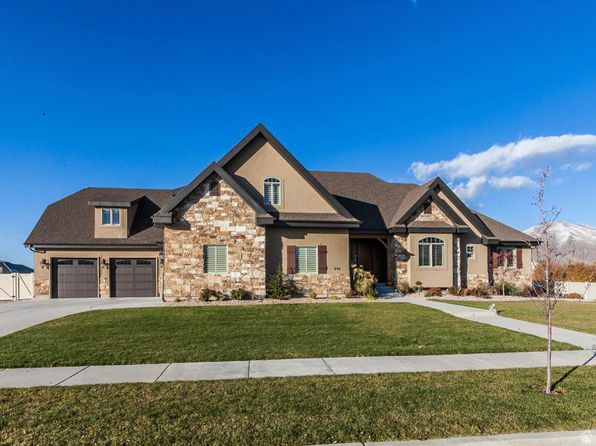 896 West 675 South Mapleton, UT 84664 - Photo 63 of 77 Craftsman inspired home featuring stone siding, concrete driveway, and a garage