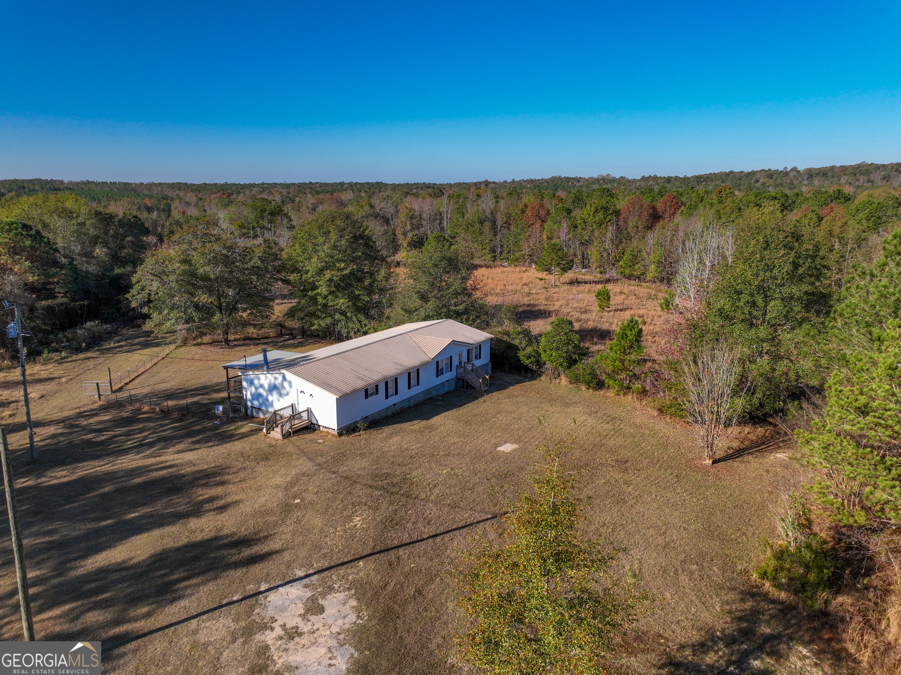 1100 Sapp Road Dry Branch, GA 31020 - Photo 1 of 54 a view of a city street from a building