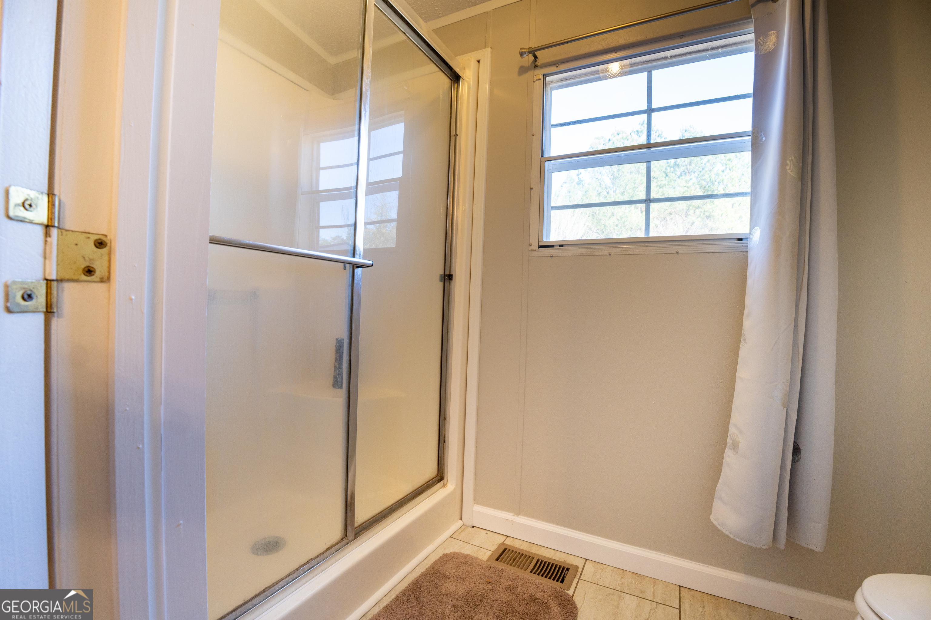 1100 Sapp Road Dry Branch, GA 31020 - Photo 18 of 54 a view of front door