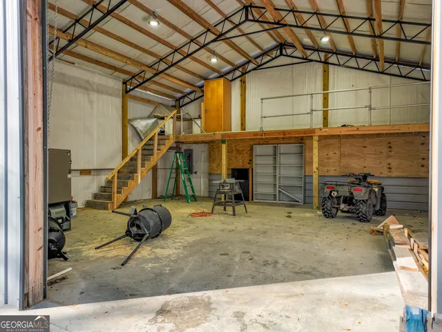 a view of a house with large windows