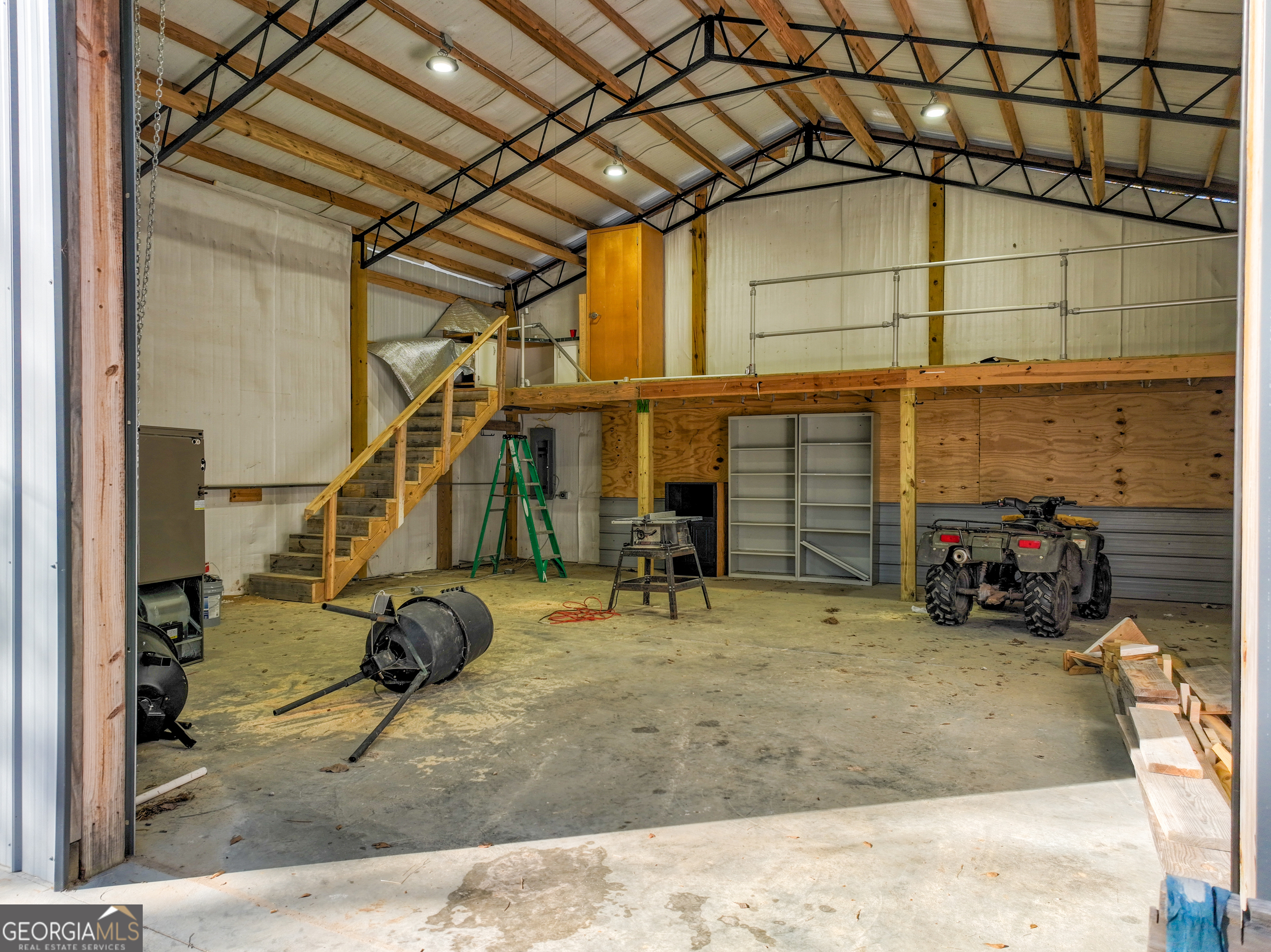 1100 Sapp Road Dry Branch, GA 31020 - Photo 29 of 54 a view of a house with large windows