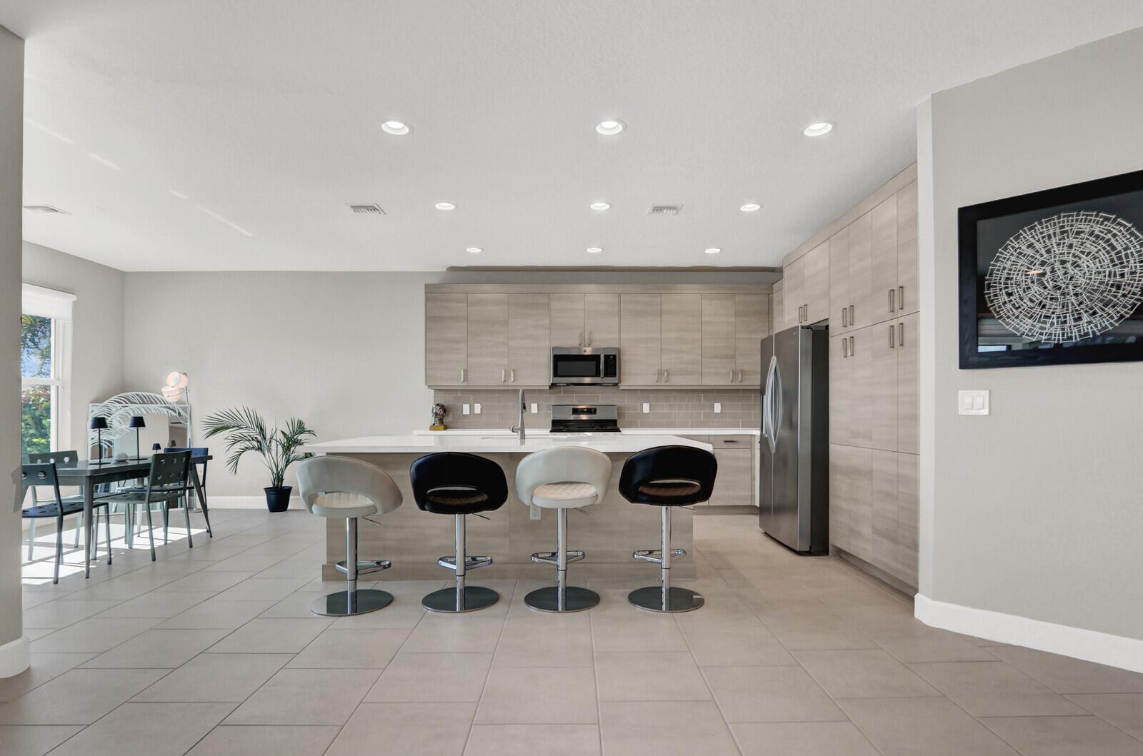 13246 Southwest Blue River Road Port St. Lucie, FL 34987 - Photo 12 of 61 Kitchen and dining room