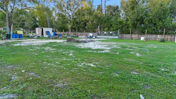 a view of a park with of swings and slides