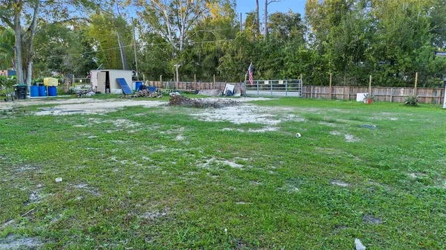 a view of a park with of swings and slides