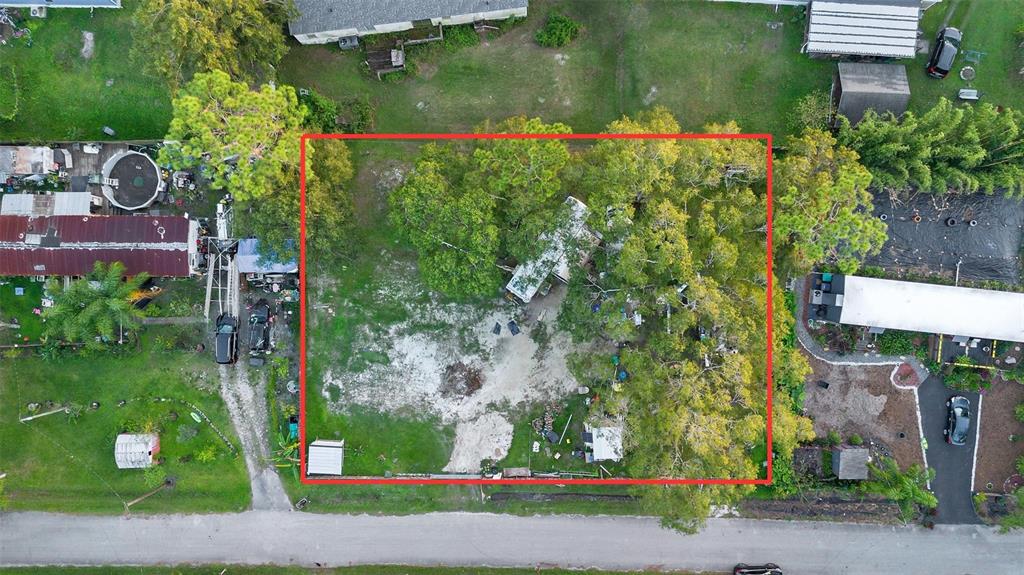 1st Avenue Orlando, FL 32820 - Photo 4 of 6 an aerial view of a house with a yard basket ball court and outdoor seating