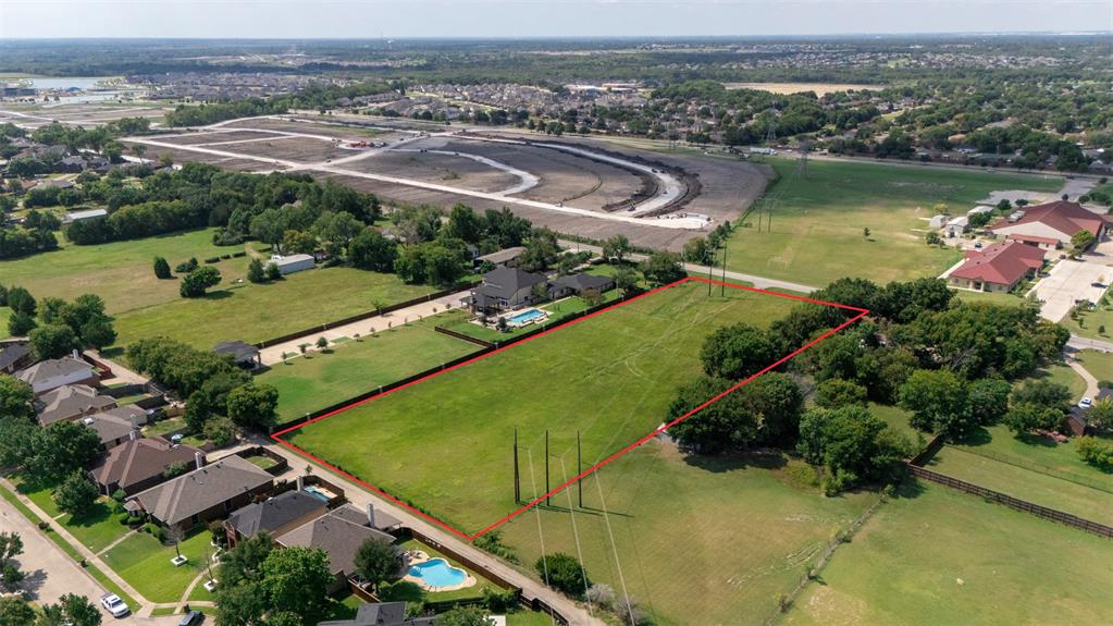 1707 Mesquite Valley Road Mesquite, TX 75149 - Photo 3 of 6 an aerial view of a city with lake view