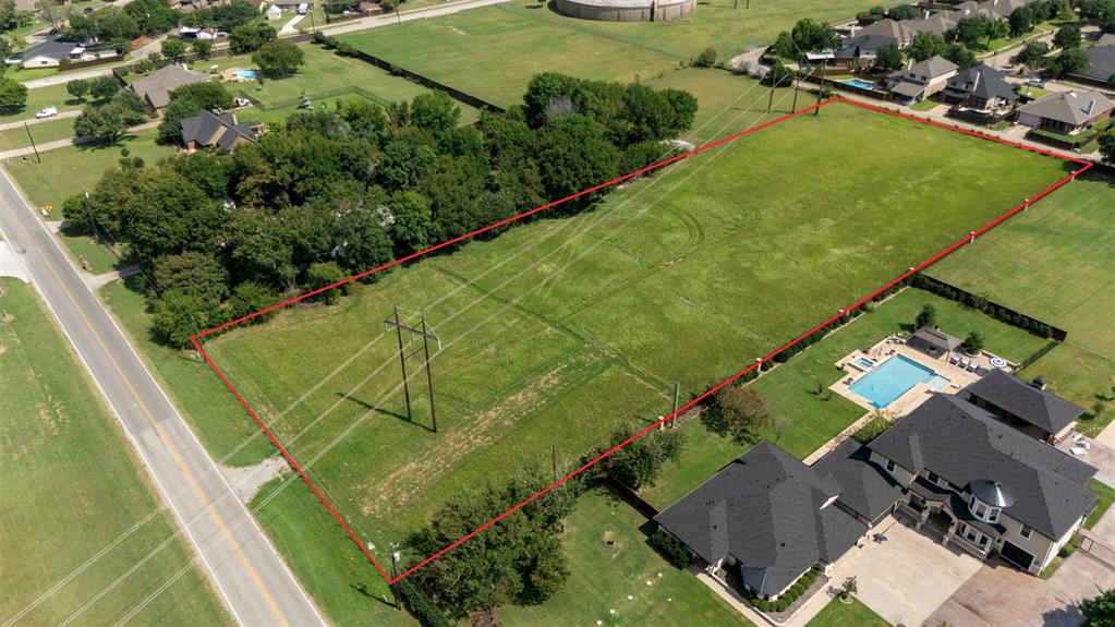 1707 Mesquite Valley Road Mesquite, TX 75149 - Photo 4 of 6 an aerial view of a residential houses with outdoor space