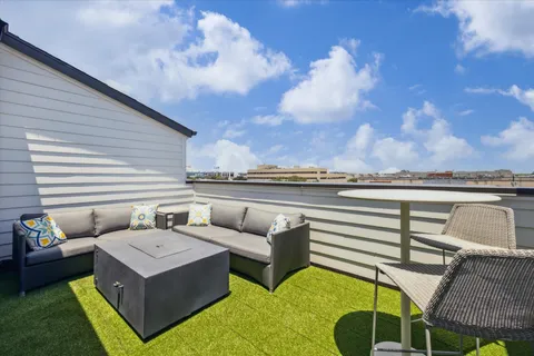 a view of a terrace with couches