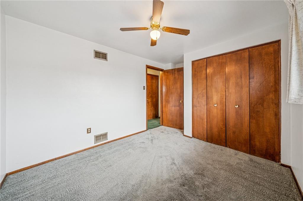 805 Willow Street Irwin, PA 15642 - Photo 18 of 33 an empty room with closet and a chandelier fan