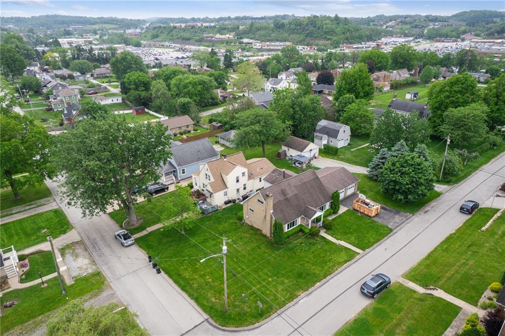 805 Willow Street Irwin, PA 15642 - Photo 29 of 33 an aerial view of green landscape with trees houses and mountain view