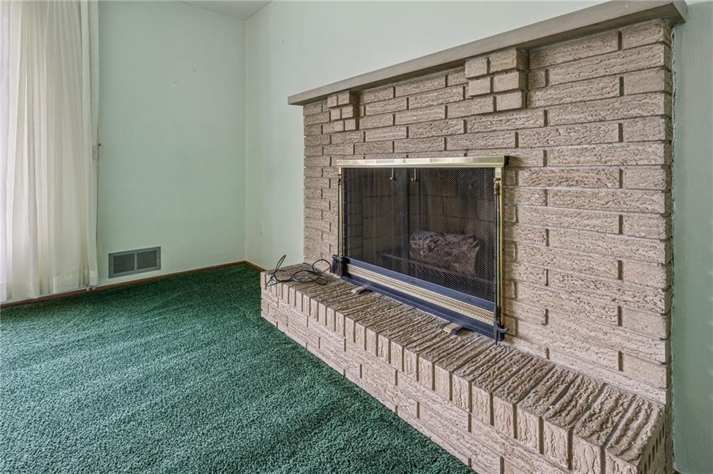 805 Willow Street Irwin, PA 15642 - Photo 6 of 33 a view of fireplace and window in a yard