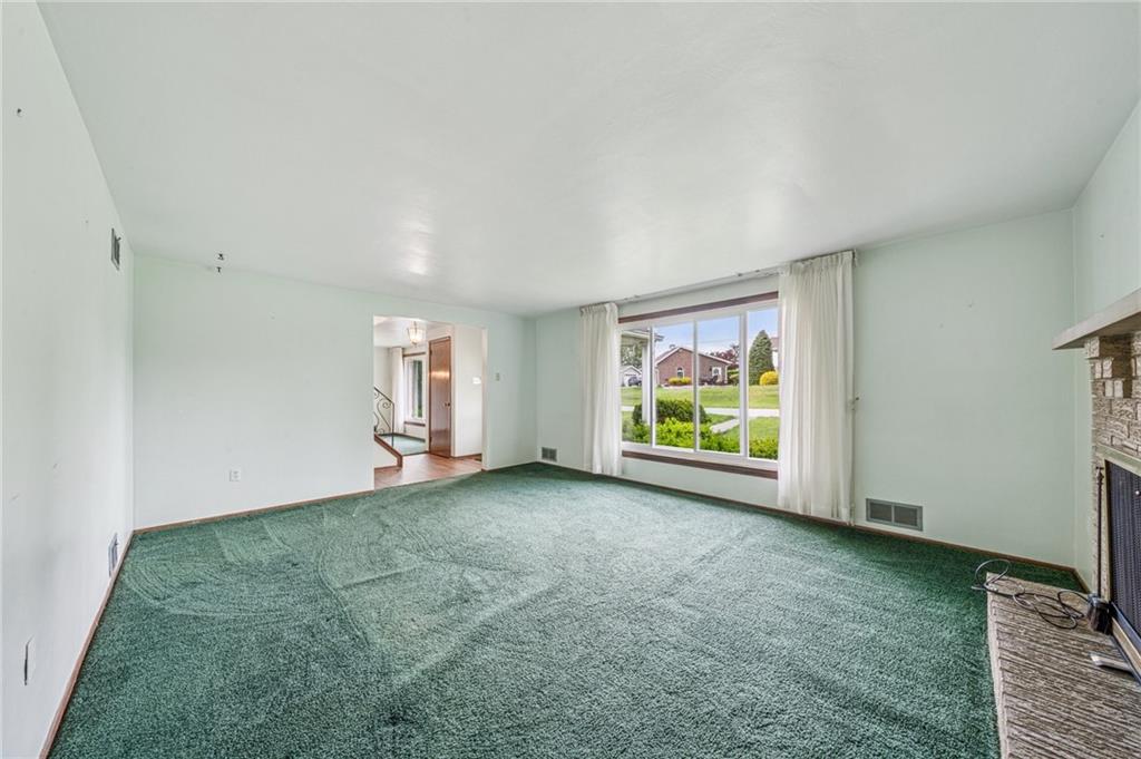805 Willow Street Irwin, PA 15642 - Photo 7 of 33 an empty room with windows