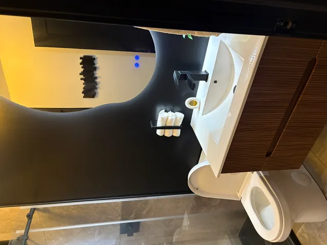 a view of a swimming pool with chairs