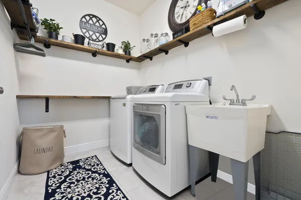 a utility room with dryer and washer