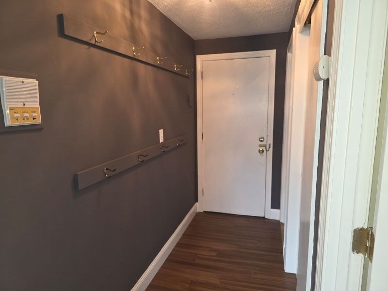 70 Mudge Street, Unit 12 Lynn, MA 01902 - Photo 16 of 22 a view of a room with wooden floor