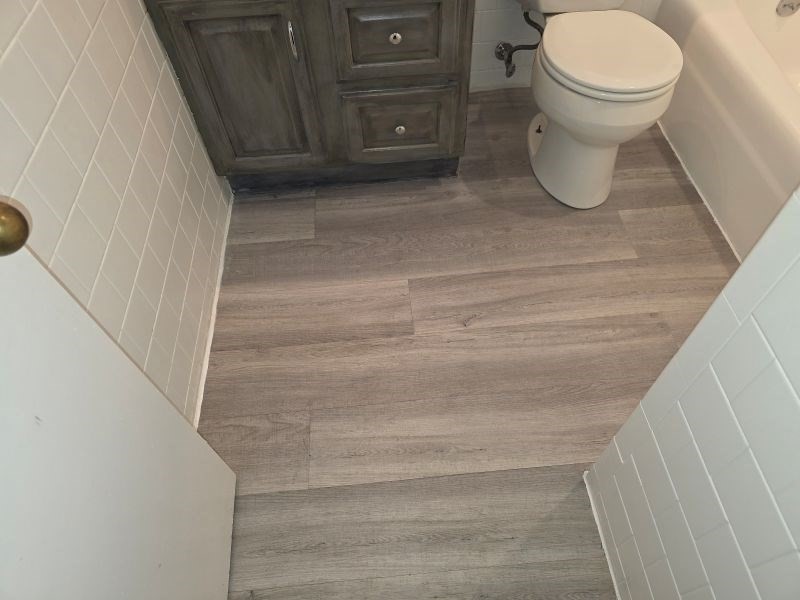 70 Mudge Street, Unit 12 Lynn, MA 01902 - Photo 19 of 22 a bathroom with a toilet and a shower