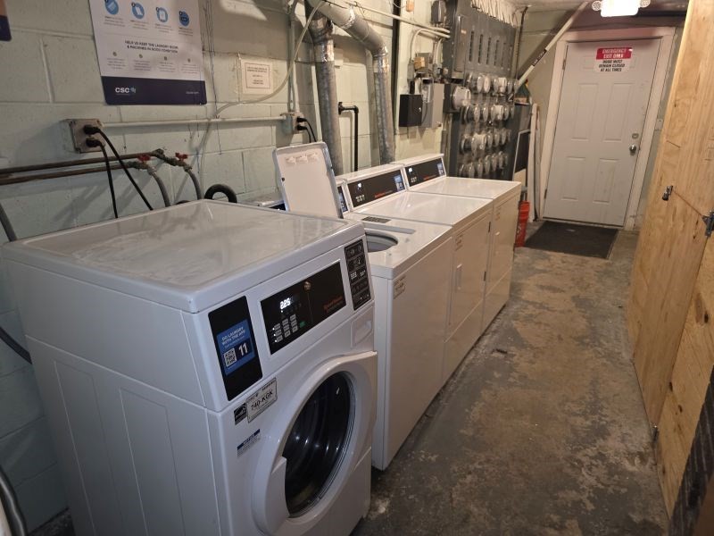 70 Mudge Street, Unit 12 Lynn, MA 01902 - Photo 21 of 22 a utility room with dryer and washer
