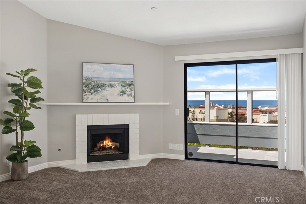 2031 Via Concha San Clemente, CA 92673 - Photo 5 of 29 a room with furniture and a fireplace