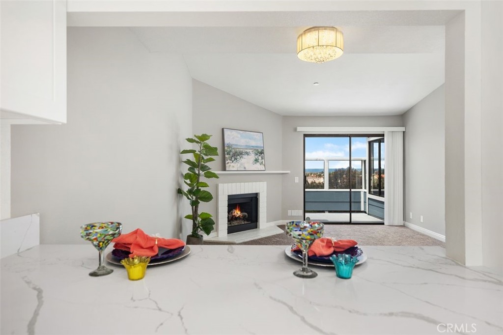 2031 Via Concha San Clemente, CA 92673 - Photo 7 of 29 a bedroom with furniture and a fireplace