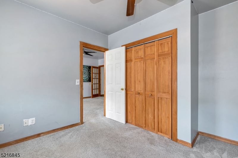 213 Linden Road, Unit 213 Roselle, NJ 07203 - Photo 9 of 14 wooden floor in an empty room
