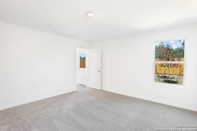 an empty room with a window