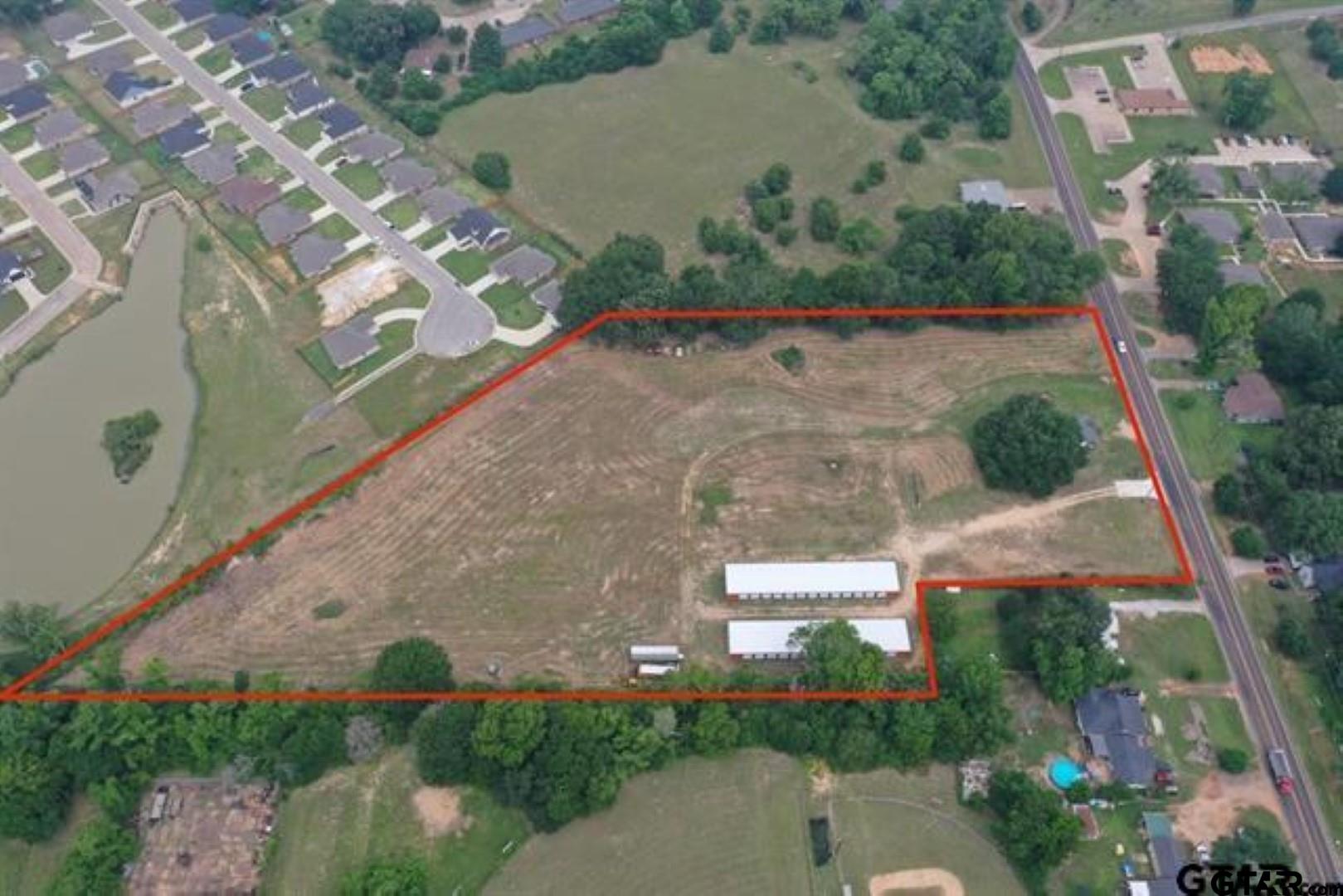 805 Dallas Street Winona, TX 75792 - Photo 19 of 20 an aerial view of a house with a yard and lake view