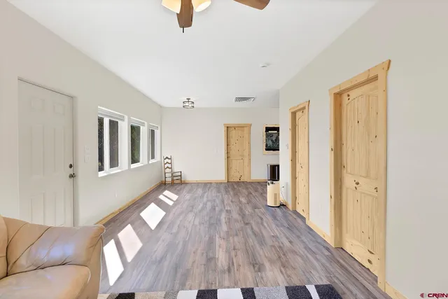 a view of livingroom with hardwood floor and window