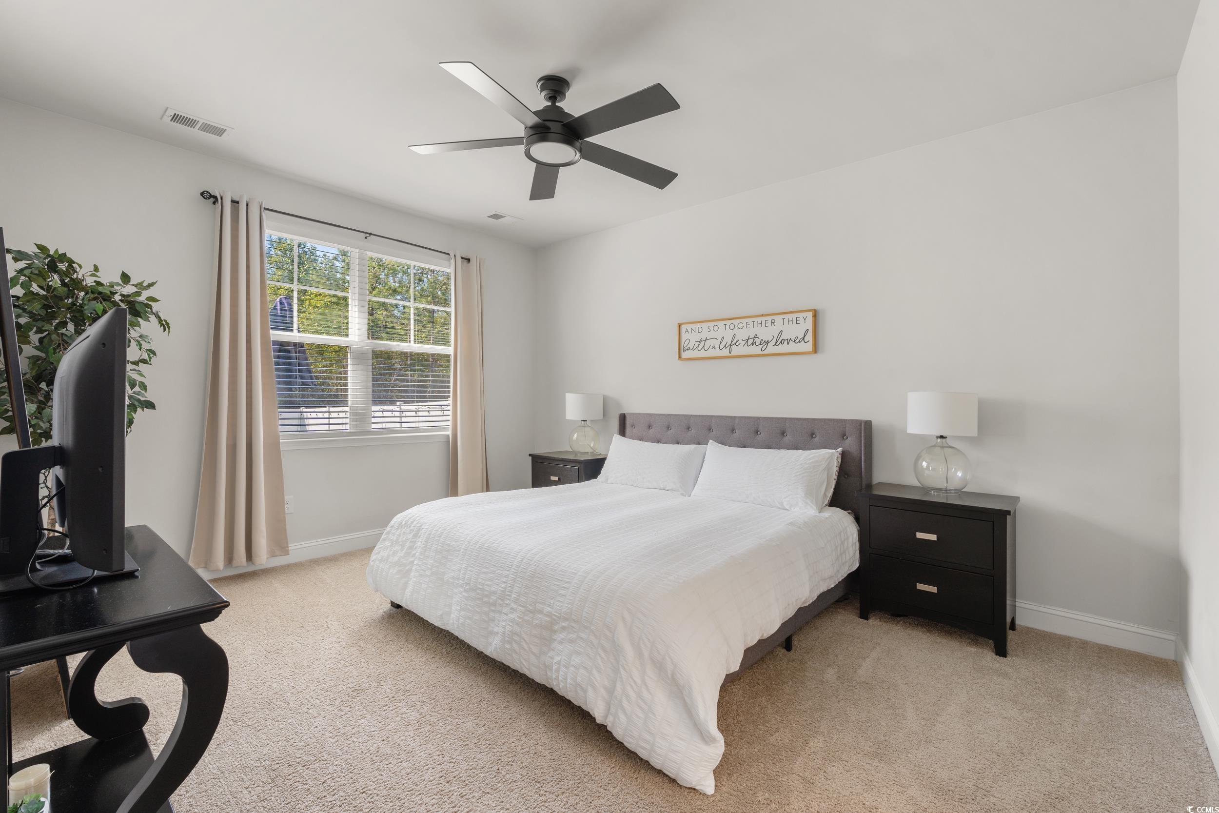 1087 Baker Creek Loop Myrtle Beach, SC 29579 - Photo 16 of 37 Bedroom featuring baseboards, visible vents, and l