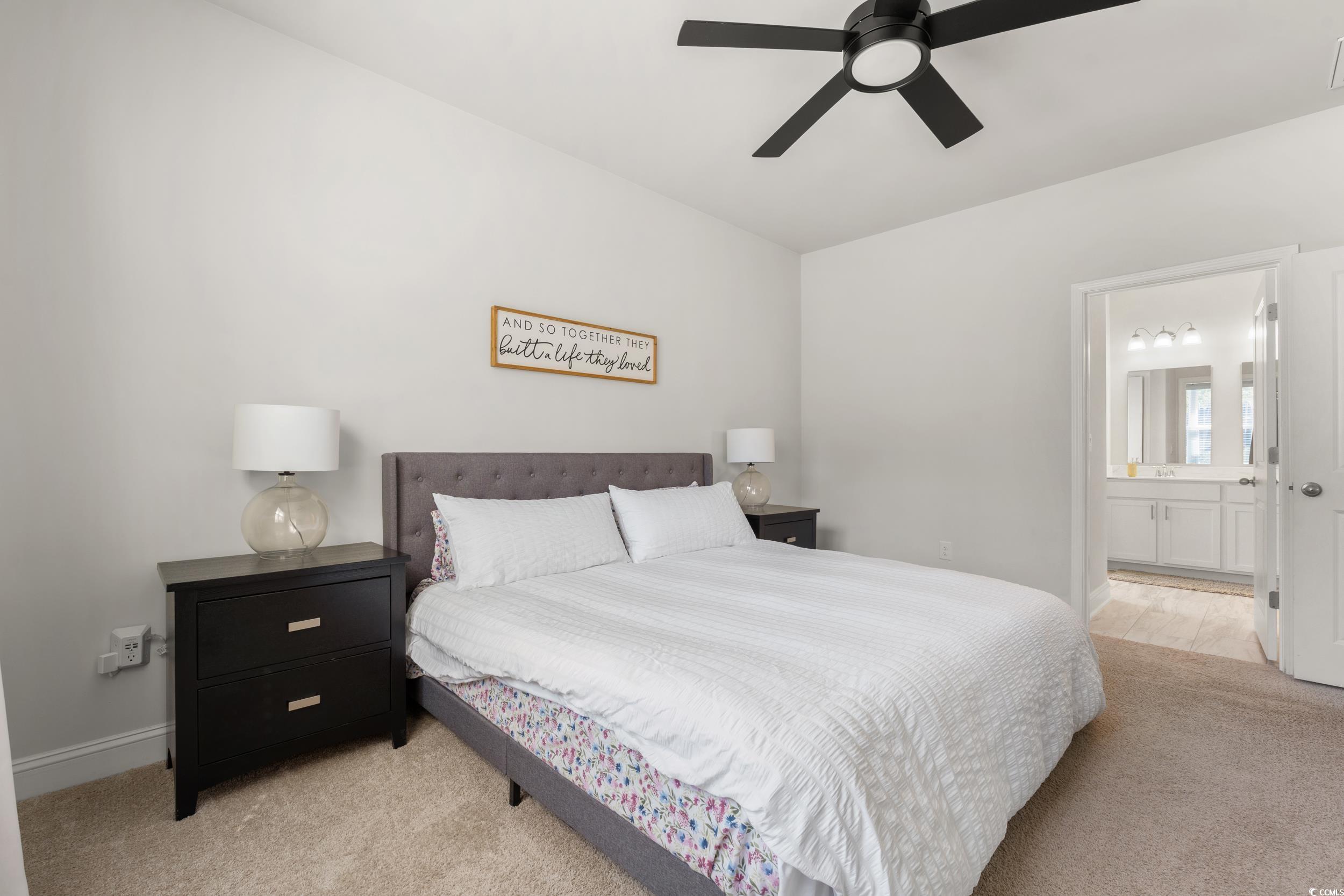 1087 Baker Creek Loop Myrtle Beach, SC 29579 - Photo 17 of 37 Bedroom with a ceiling fan, baseboards, light carp