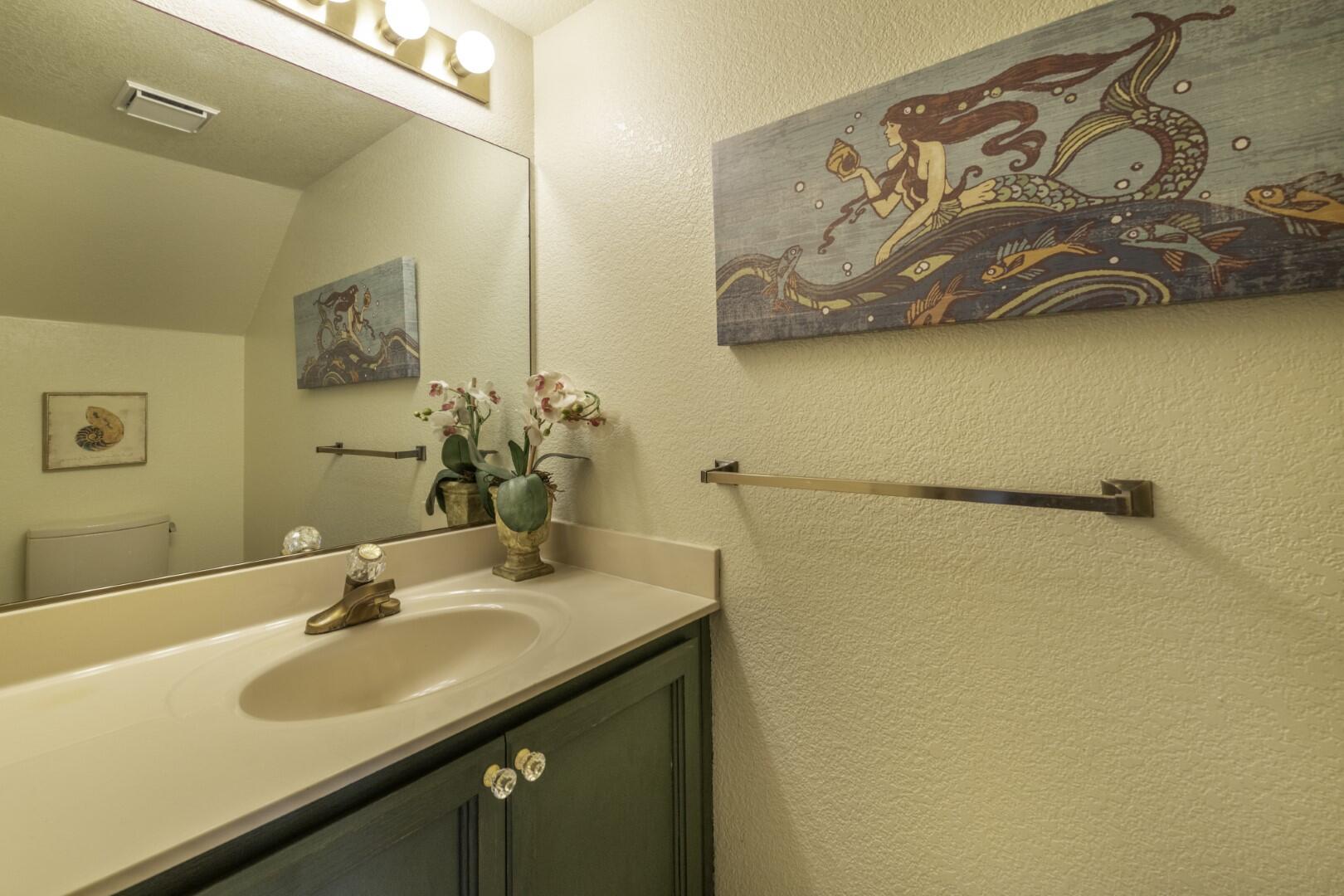 200 Ridgetop Drive, Unit 36 Redding, CA 96003 - Photo 12 of 24 a bathroom with a sink and a mirror