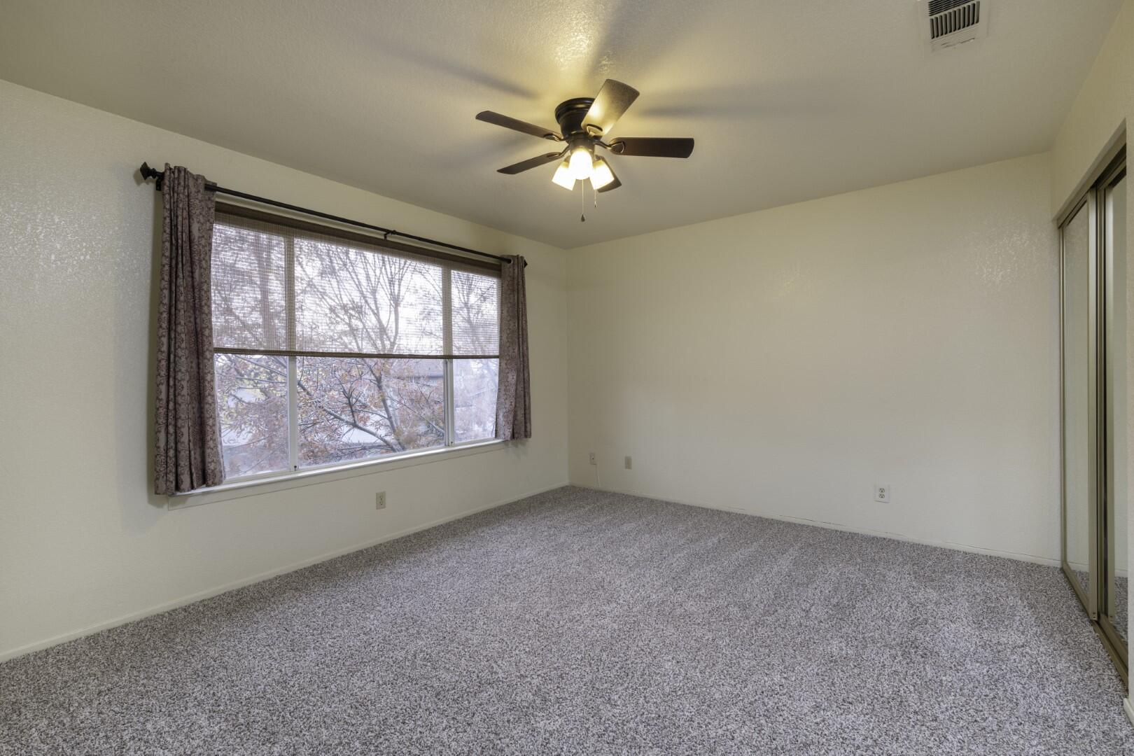 200 Ridgetop Drive, Unit 36 Redding, CA 96003 - Photo 13 of 24 an empty room with a window