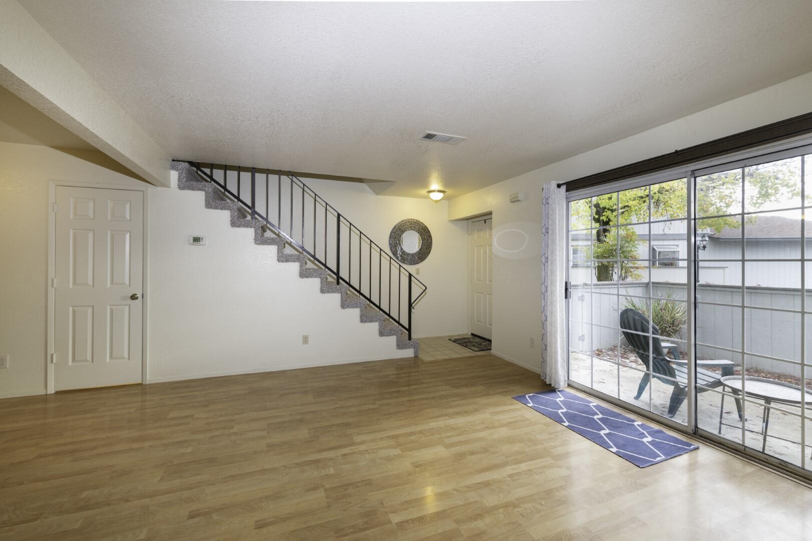 200 Ridgetop Drive, Unit 36 Redding, CA 96003 - Photo 9 of 24 a view of an empty room with windows