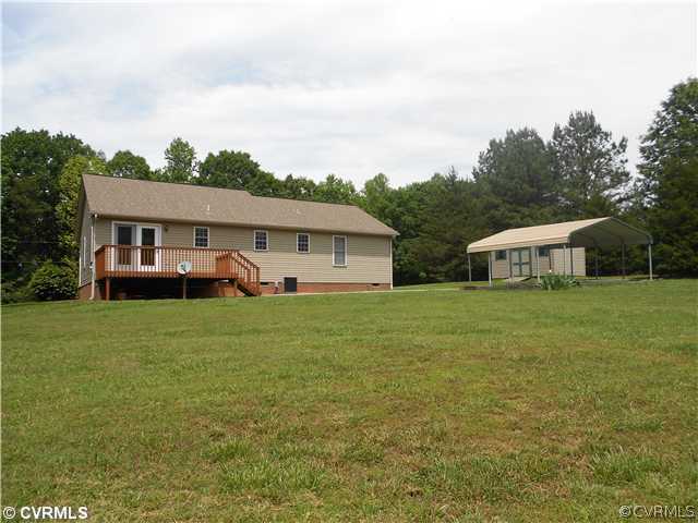 151 Sunset Ridge Drive Farmville, VA 23901 - Photo 11 of 12 a front view of house with yard and trees in the background